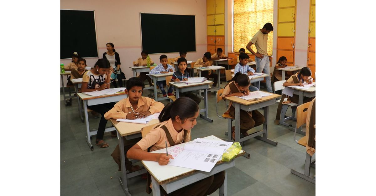 Students taking the entrance exam for the Sitare Foundation programme 