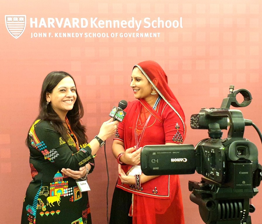 artisan ruma devi from barmer, rajasthan talks to an interviewer at harvard kennedy school 