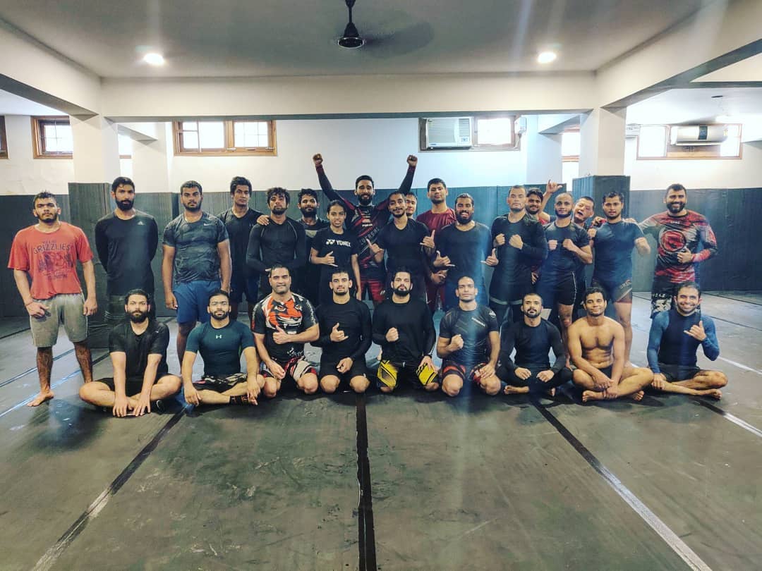 Comrades in arms on his Road to UFC: Fighters at the CFC Gym in Delhi posing for a photograph.