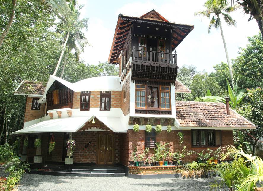 an eco friendly home in kottayam made from 100 year old recycled wood