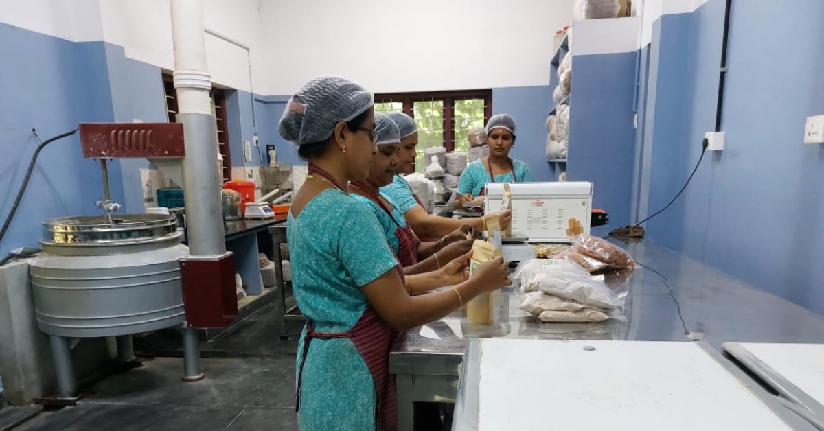 Staff engaged in packaging products at Minnus Fresh. 