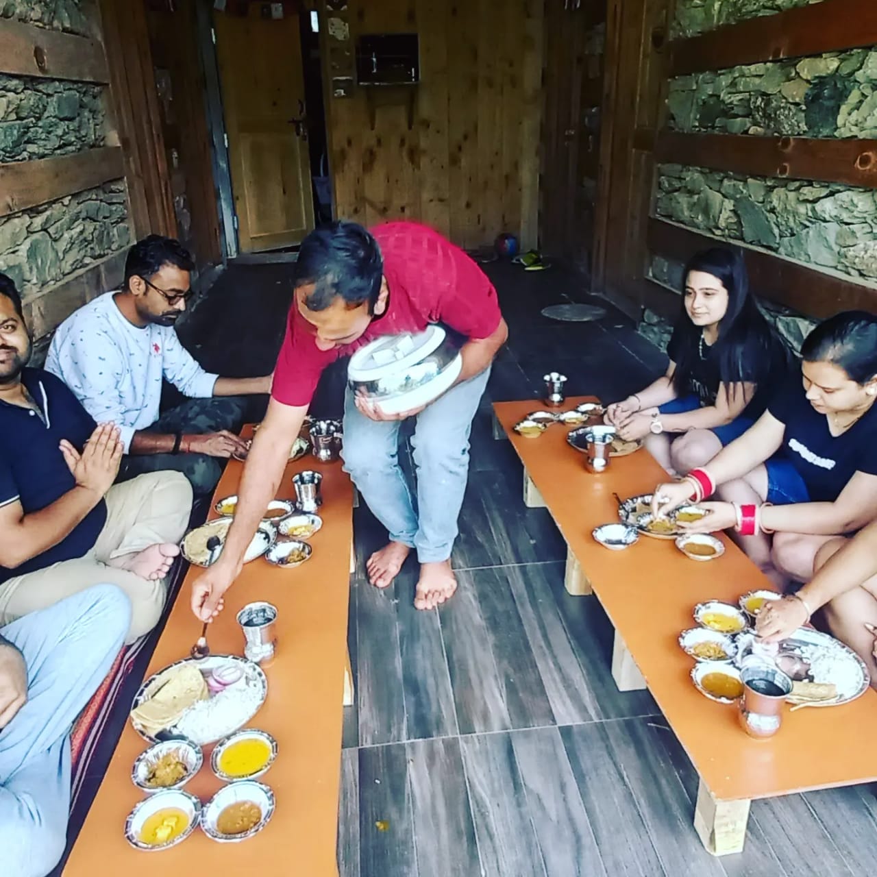 traditional himachali food being served to guests at an eco friendly homestay in sainj valley 