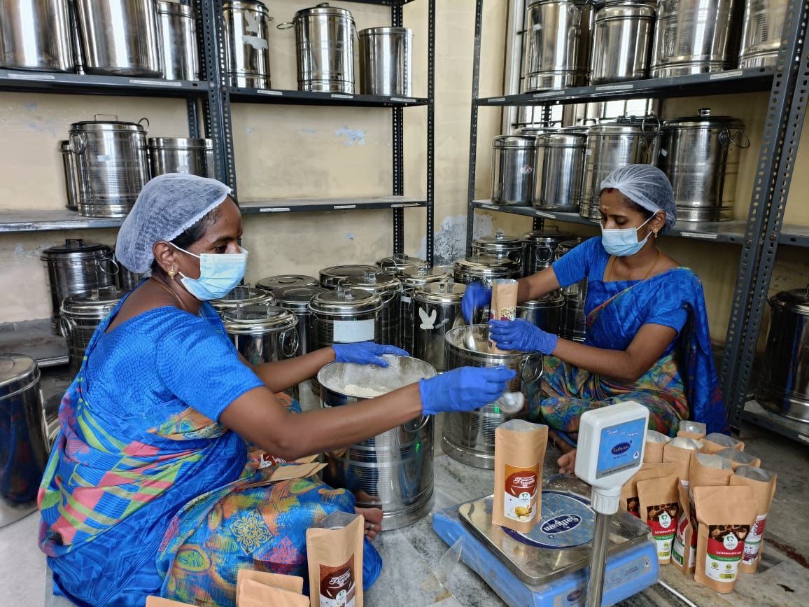 Women packing orders at My Little Moppet, a startup that sells traditional mixes for babies