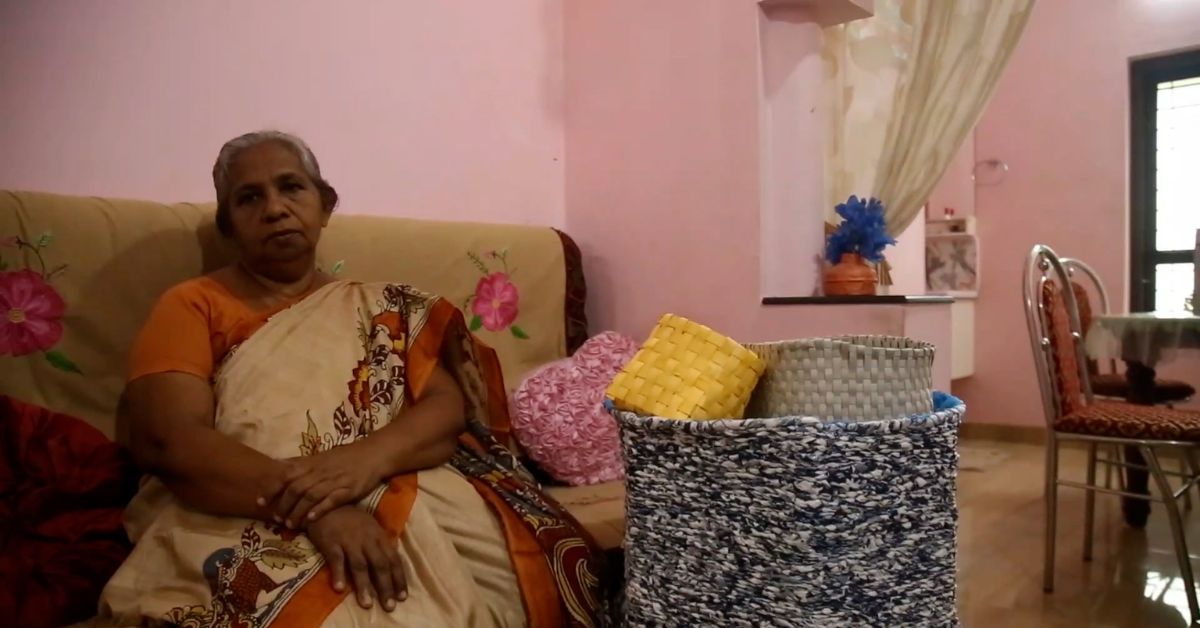 kerala resident leelamma mathew sits next to laundry bags and purses created from upcycled milk packets