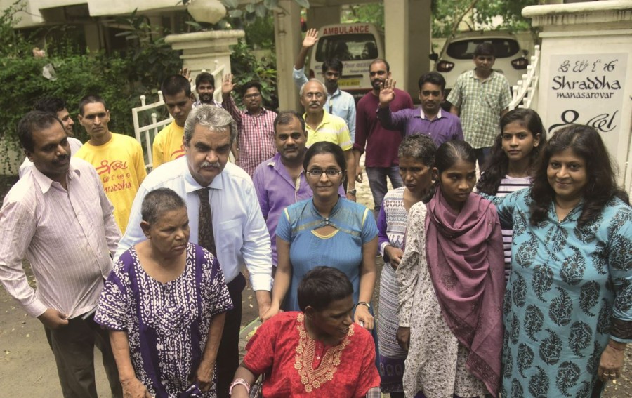 Dr Bharat Vatwani and wife with  Shraddha Rehabilitation Foundation patients.