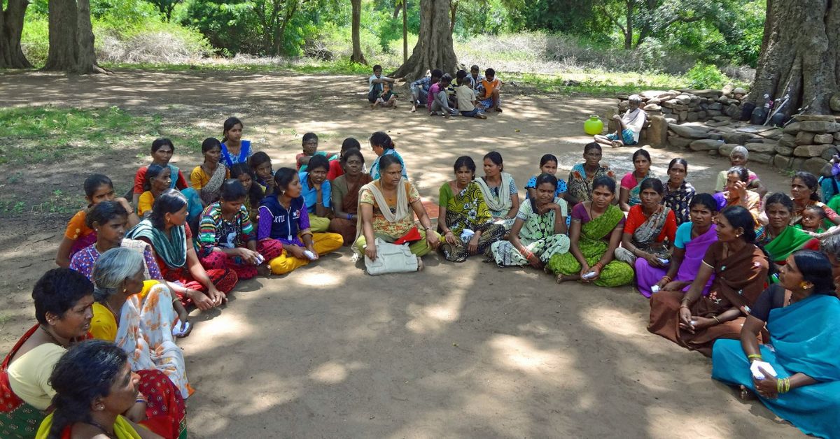 Valliammal meeting tribal women for helping them set up kitchen garden.