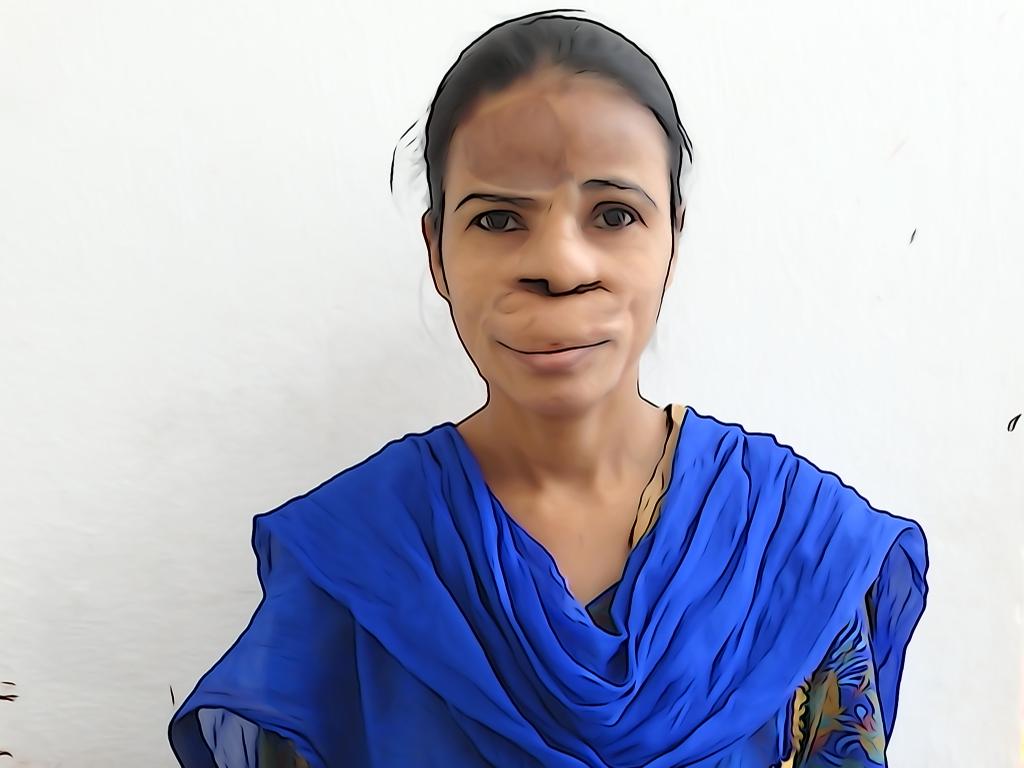 A woman wearing a blue kurta with a distorted face. 