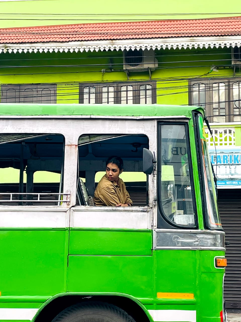 Ann driving the bus