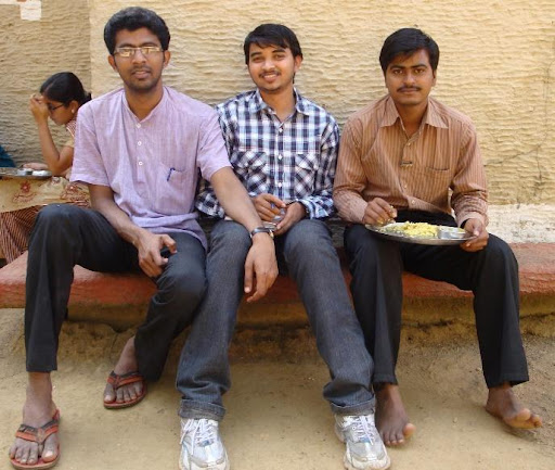 VOPA co-founder Prafulla Shashikant sits between two friends 