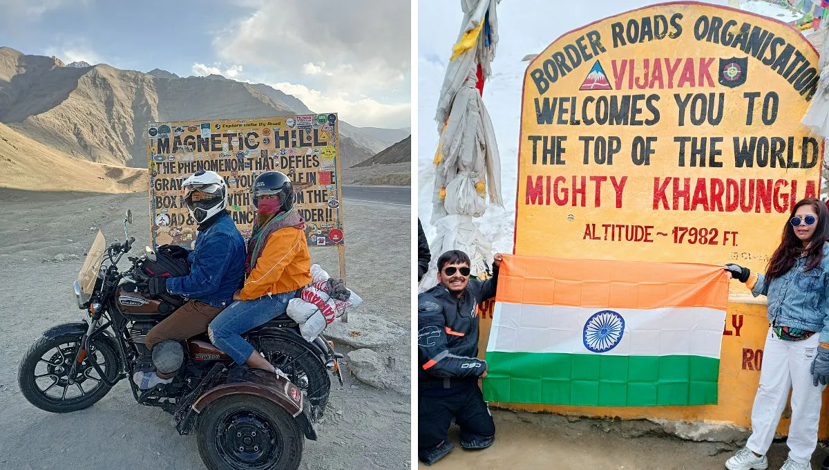 a couple poses on their bike and near the khardungla pass with an indian flag 