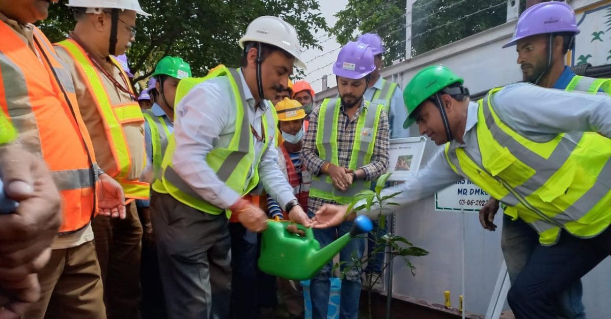 uniformed personnel of the delhi metro carry out a tree plantation drive organised by the delhi metro rail corporation 