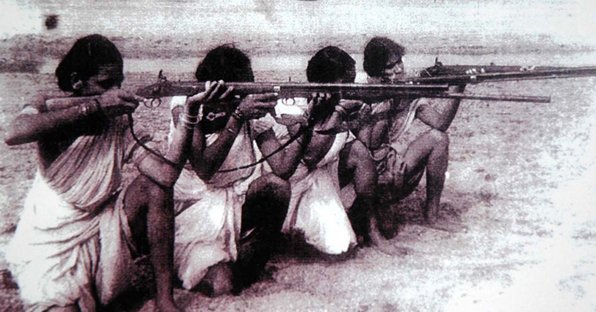 four peasant women armed with guns practice aiming and shooting during the telangana rebellion