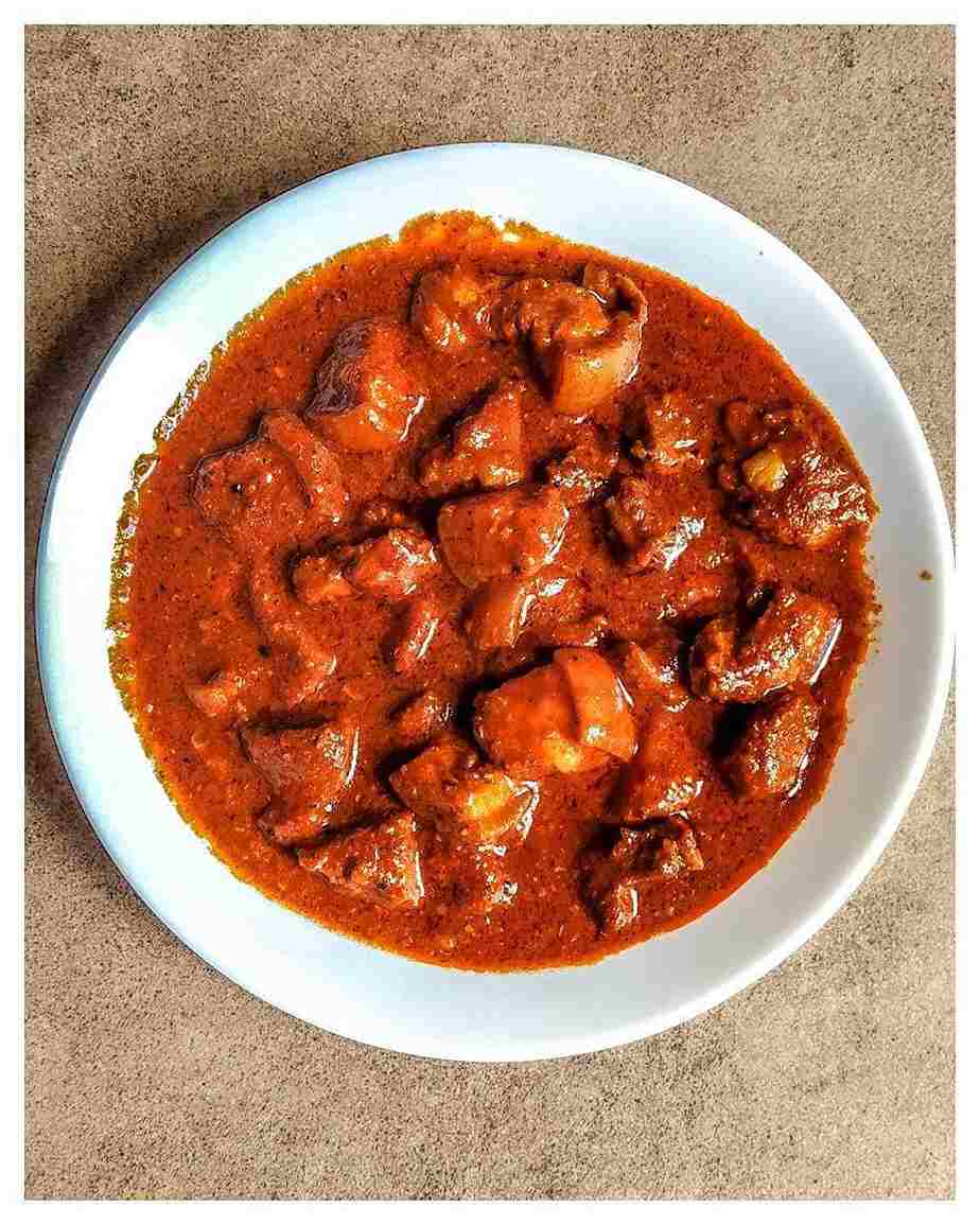 bowl of pork vindaloo, made with traditional masala and spices