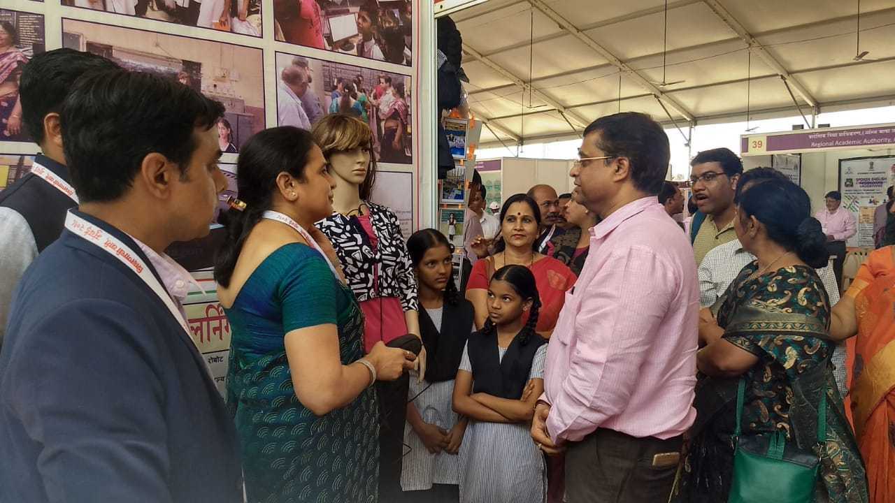 Pooja with BMC Deputy Commissioner Mr. Milind Sawant at the Shiksanwari Gallery Government Program