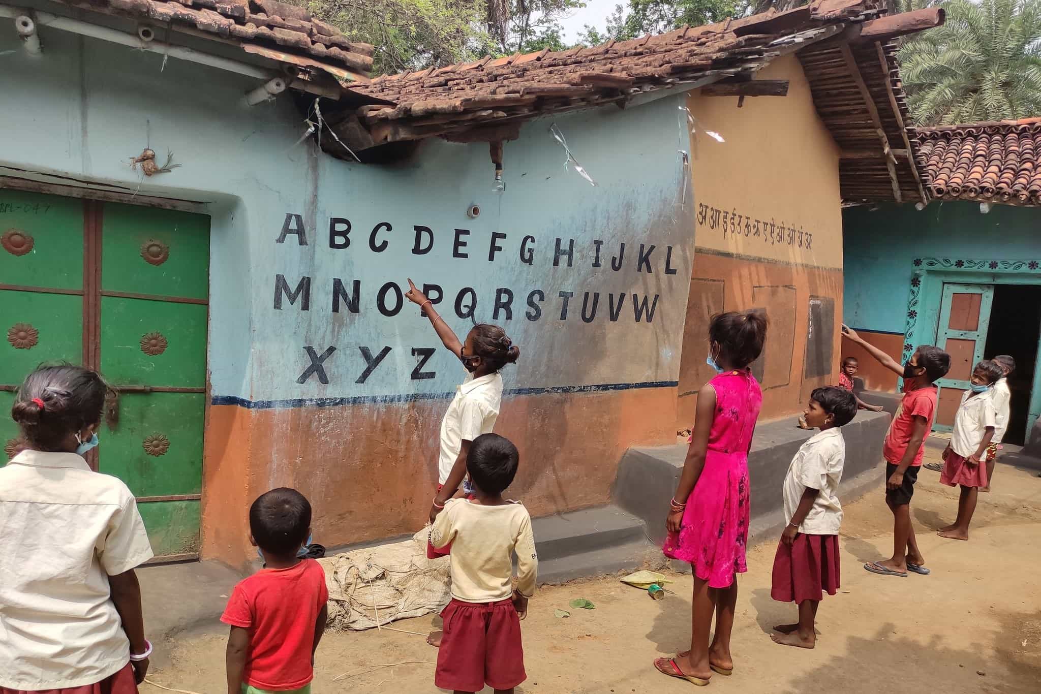 Children below six learning basics in Dumka, Jharkhand.