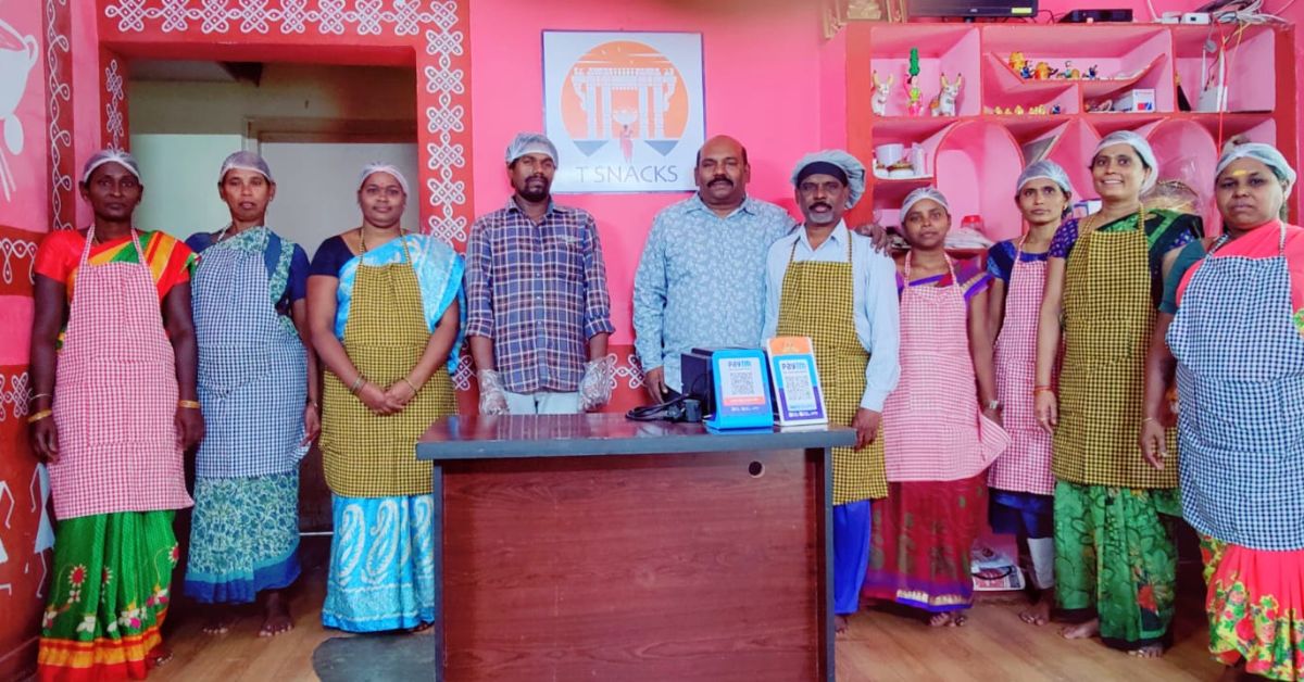 Rajendra Prasad along with his employees at his cloud kitchen in Hyderabad.