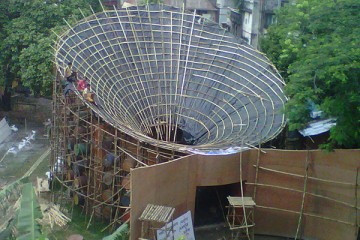 before and after images of the creation of a puja pandal