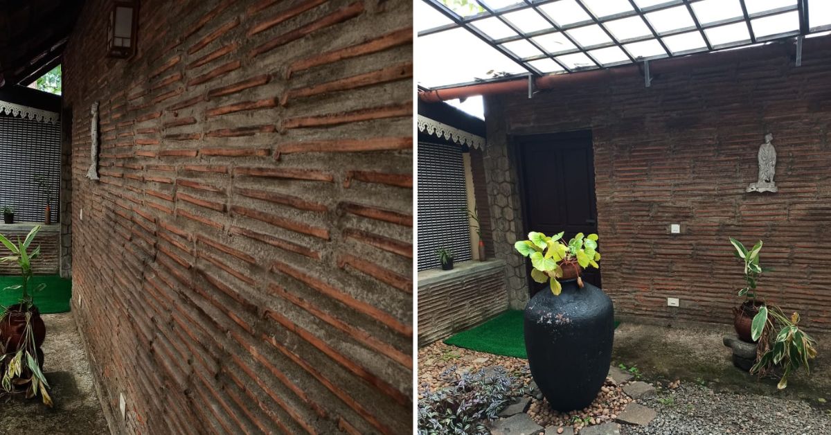 A wall made of roof tiles in the courtyard.