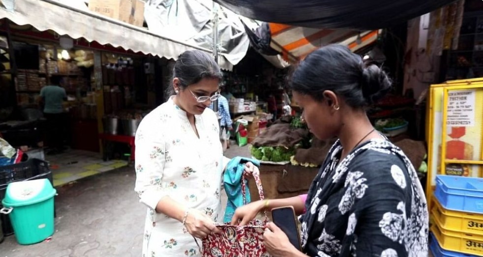 dr ruby checking the cloth bags to be distributed as part of vikalp project