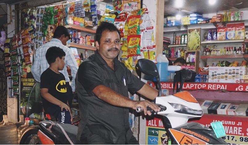 Krishan Kumar Bajpayee, a distributor for Mother Dairy in South Delhi, switched to using an electric scooter about a month ago. 