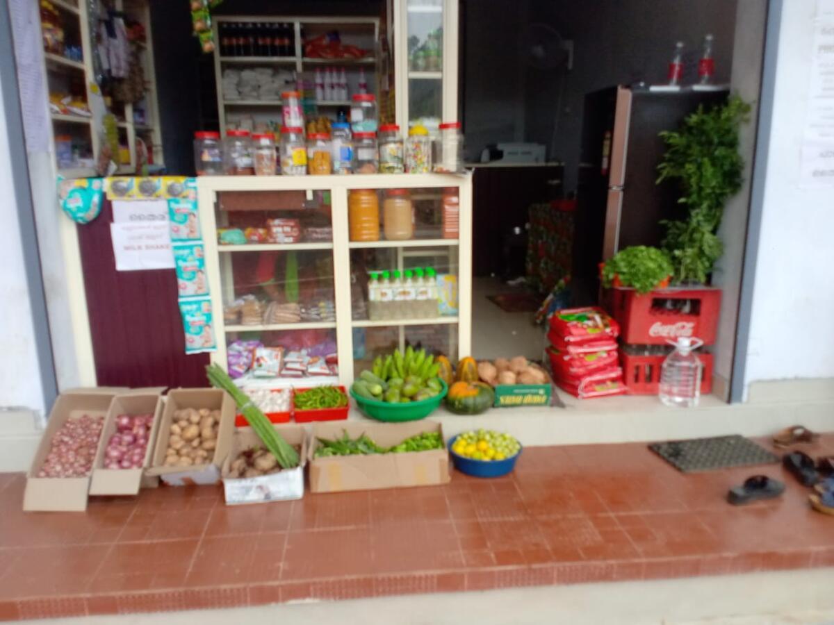 Thankamma teacher inspecting the products made in the day-care manavodaya pakalveedu