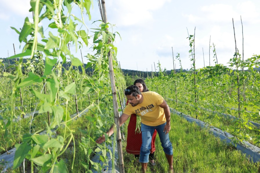 Philip and his wife in their farm in alappuzha