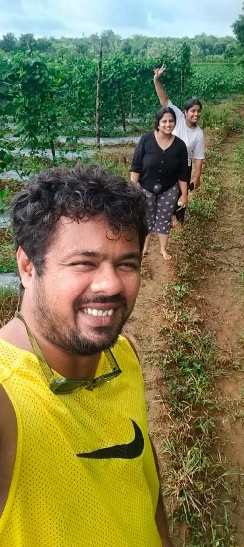 philip chacko with his family in the farm