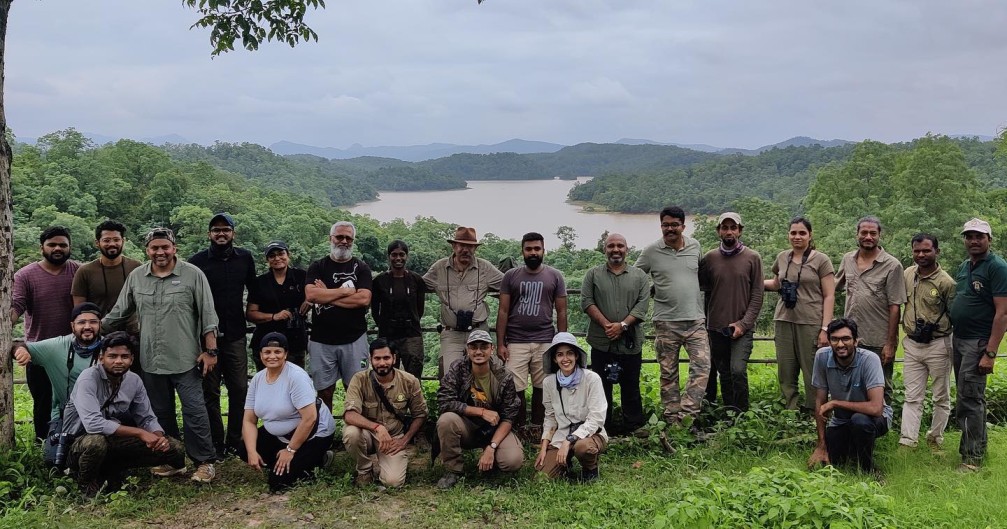 Happy guests with the staff of pugdundee after a safari