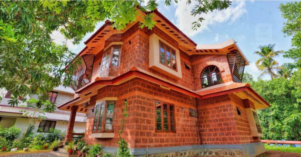 eco friendly house in thrissur made of red stone and mud