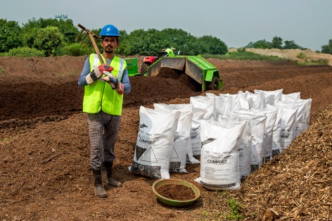 compost packing at the regenerative farming hub of urban farms co in palla near new delhi 