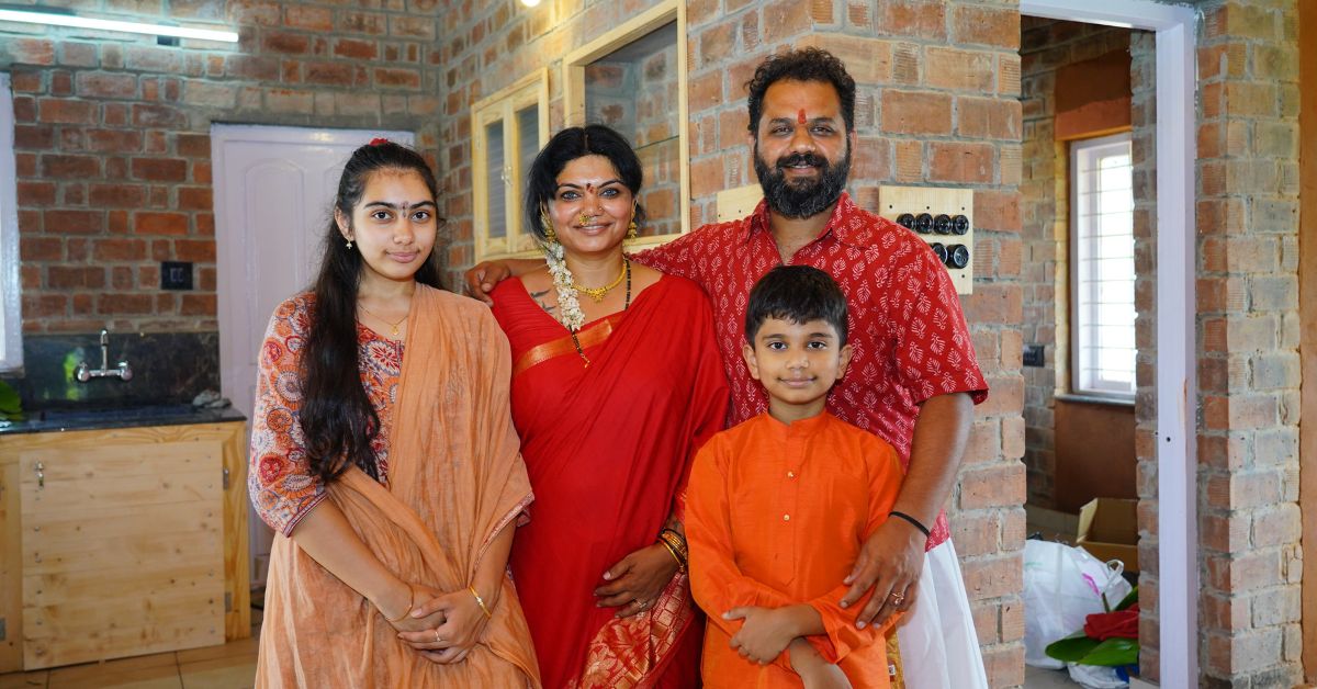 Pushpa and Kishan, who have built a food forest and mud cottage near bangalore, with their children.