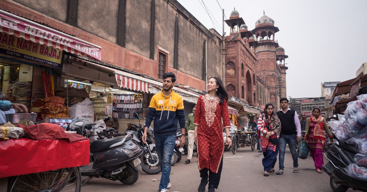 Ritik Gupta, Founder of Trocals with a tourist on a local walk