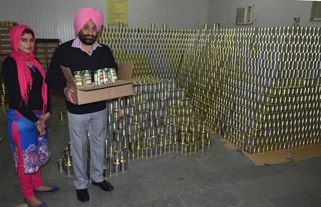 Jagmohan with his canned produce