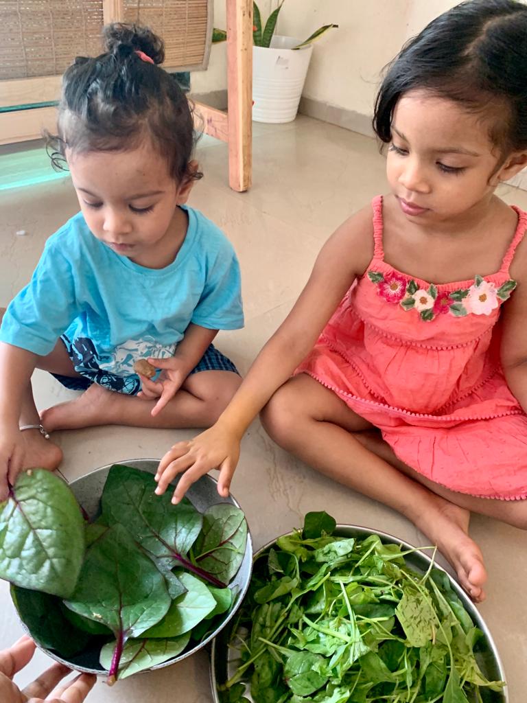 Subhashree's children with the produce.