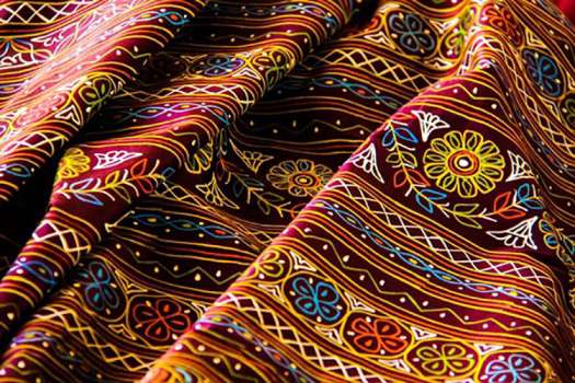 Rogan art is painted on scarfs, rugs, sarees etc