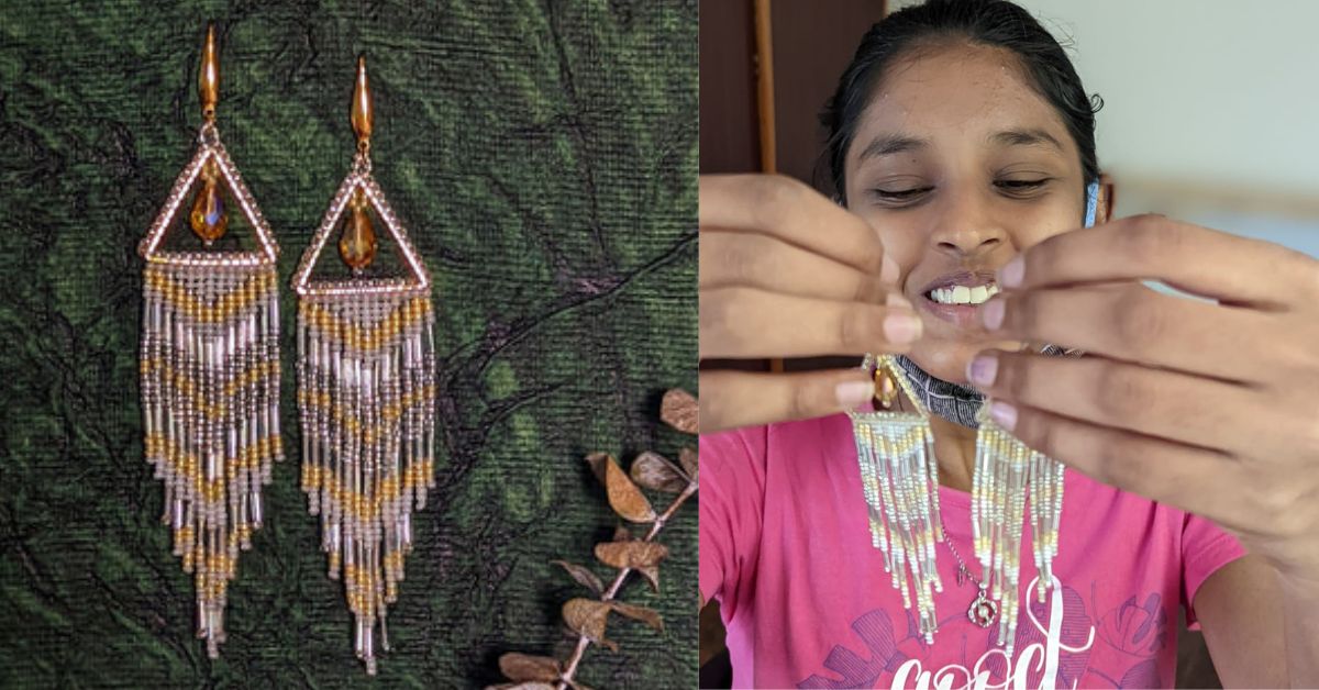 Dharavi shows earrings that she made using beads.