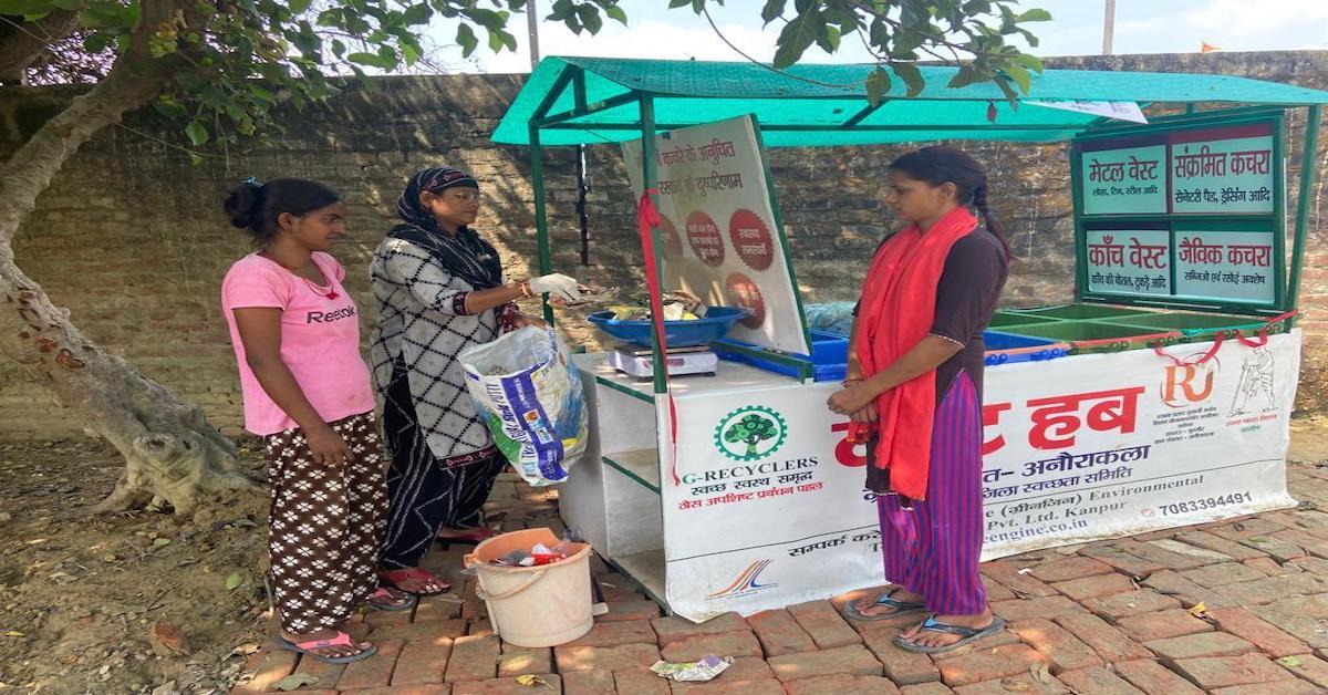 Women giving waste at a Greengine waste hub