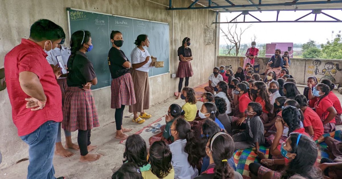 teachers and volunteers at yuwa football teach girls from jharkhand