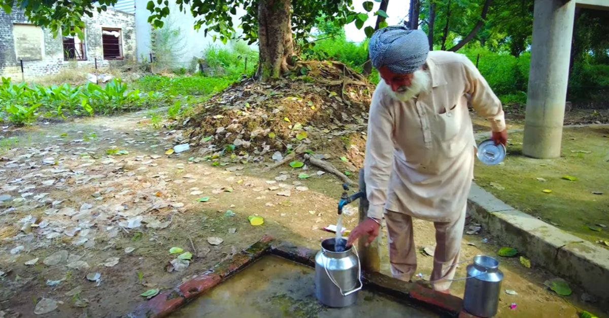 Residents drawing clean water.