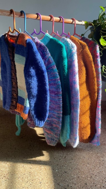 Sohail knits colourful sweaters.