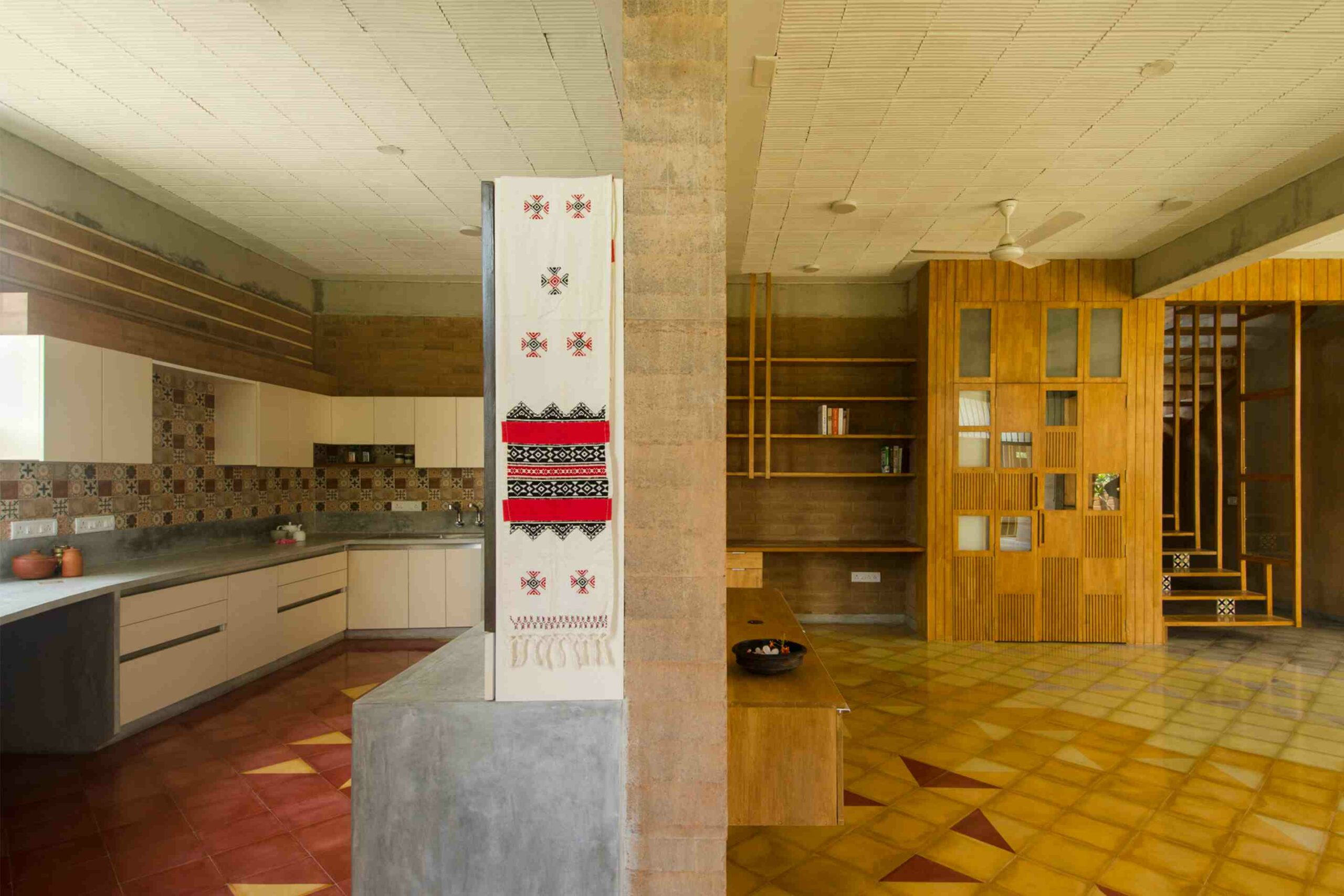 The kitchen and living room have walls made out of compressed stabilised earth blocks