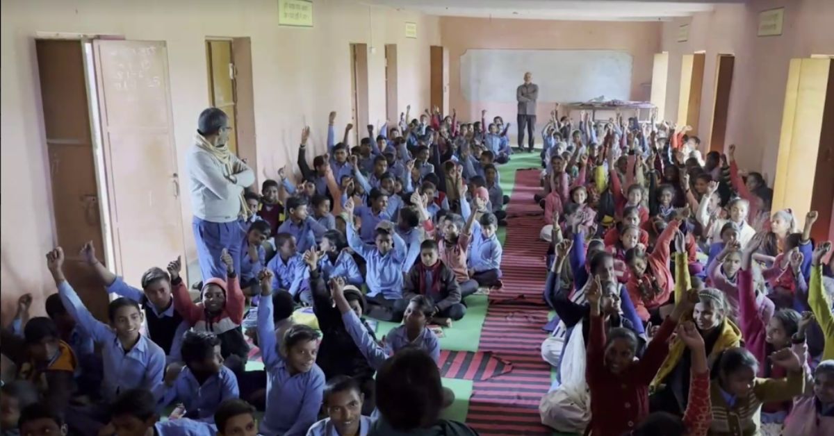 Going to school, children raise their hands