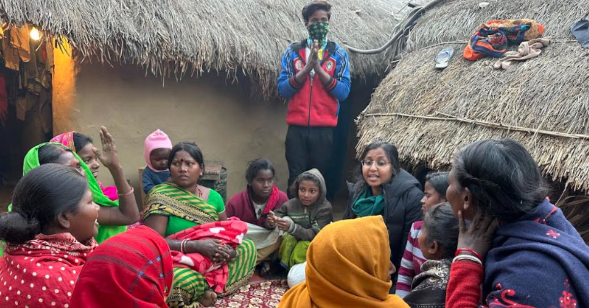 BIRD team interacts with girls and women in a village