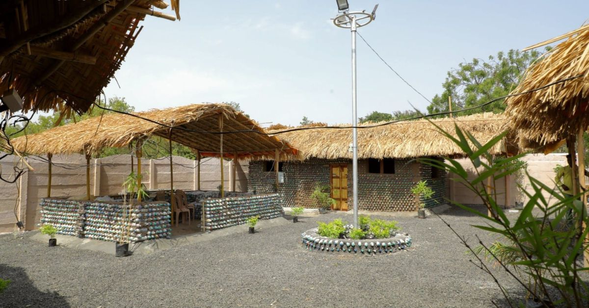 Their eco-friendly house comprises two square-shaped rooms which are partially open, and one round hut.