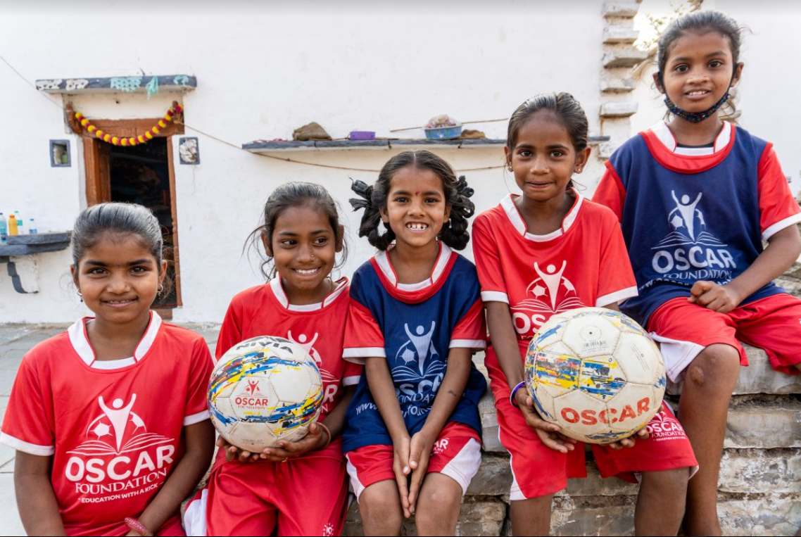 Girls are coached to play football and they are also taught about various topics such as menstruation