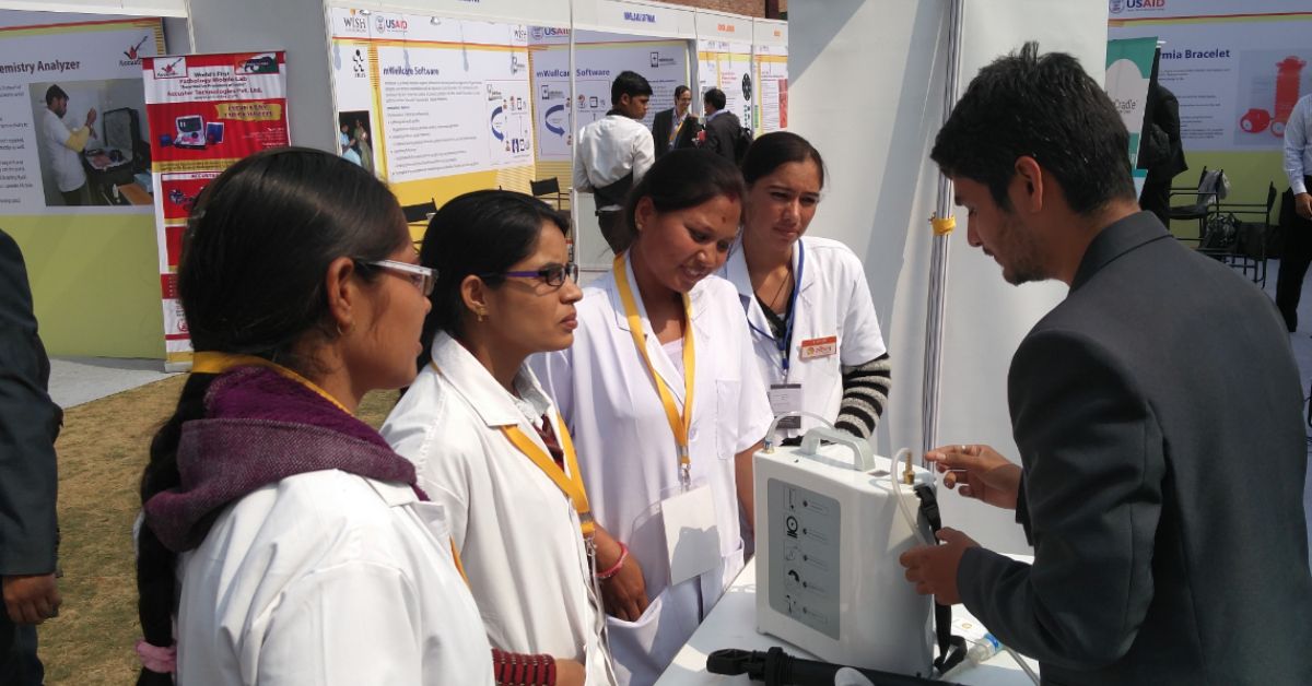 Engineer Nitesh Kumar Jangi receives initial feedback from nurses for his breathing device Saans 