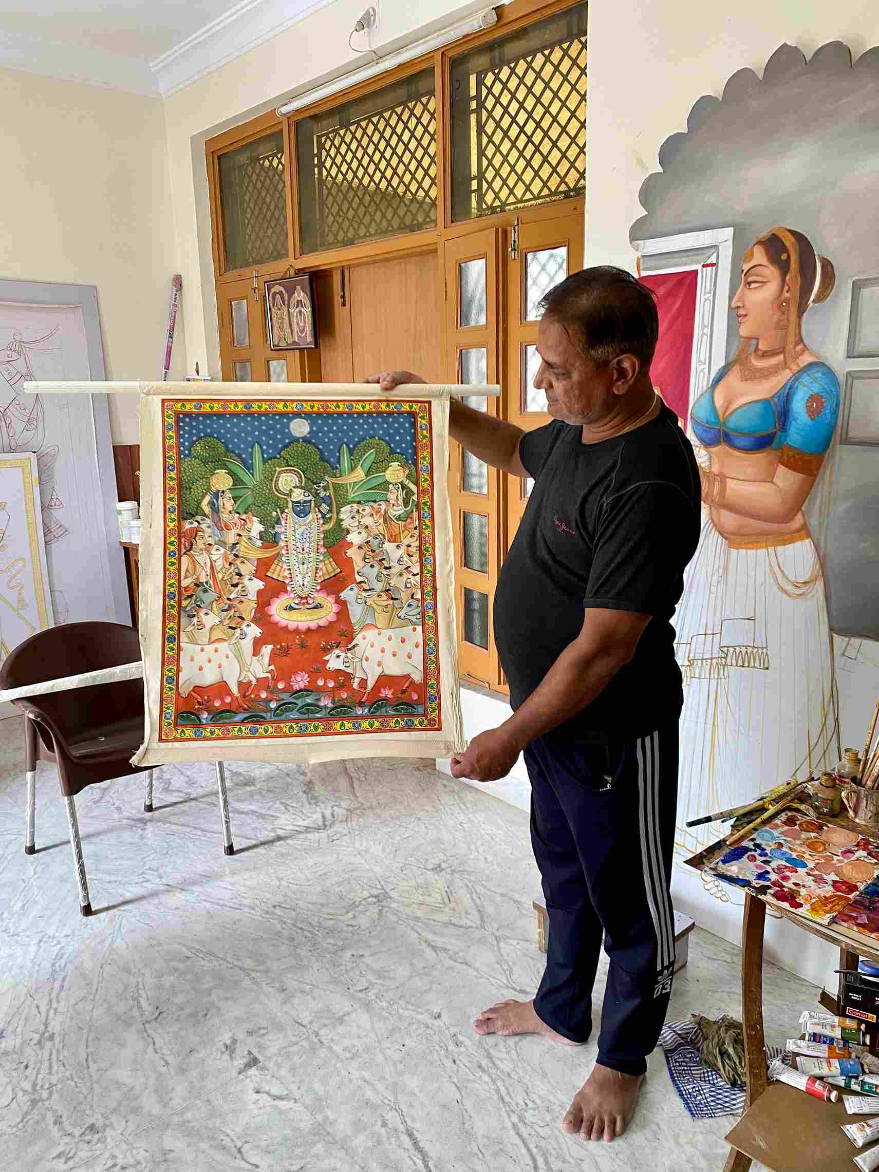 Para seniman Nathdwara terlibat dalam melestarikan bentuk seni pichwai sebagai penghormatan kepada Shreenathji.