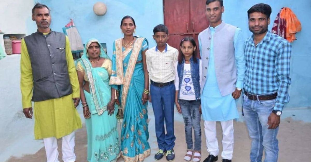 Santosh with his family back in village.