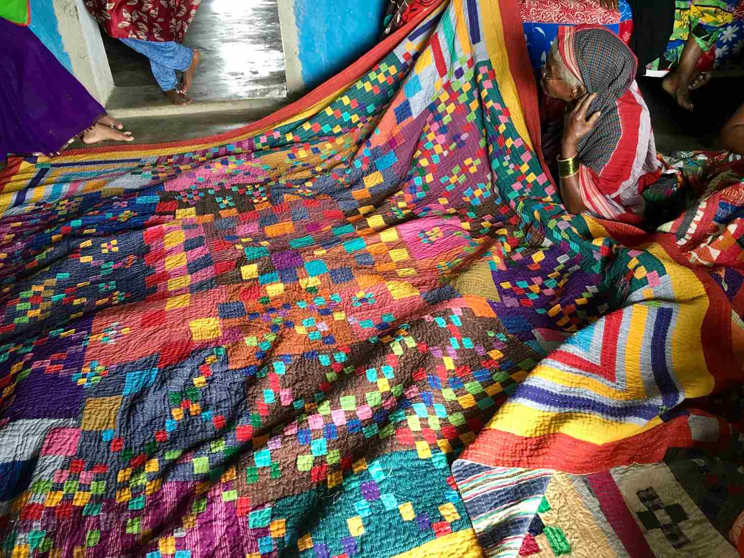 The Siddi quilts are pieced together by stitching frayed bits of cloth and layering these