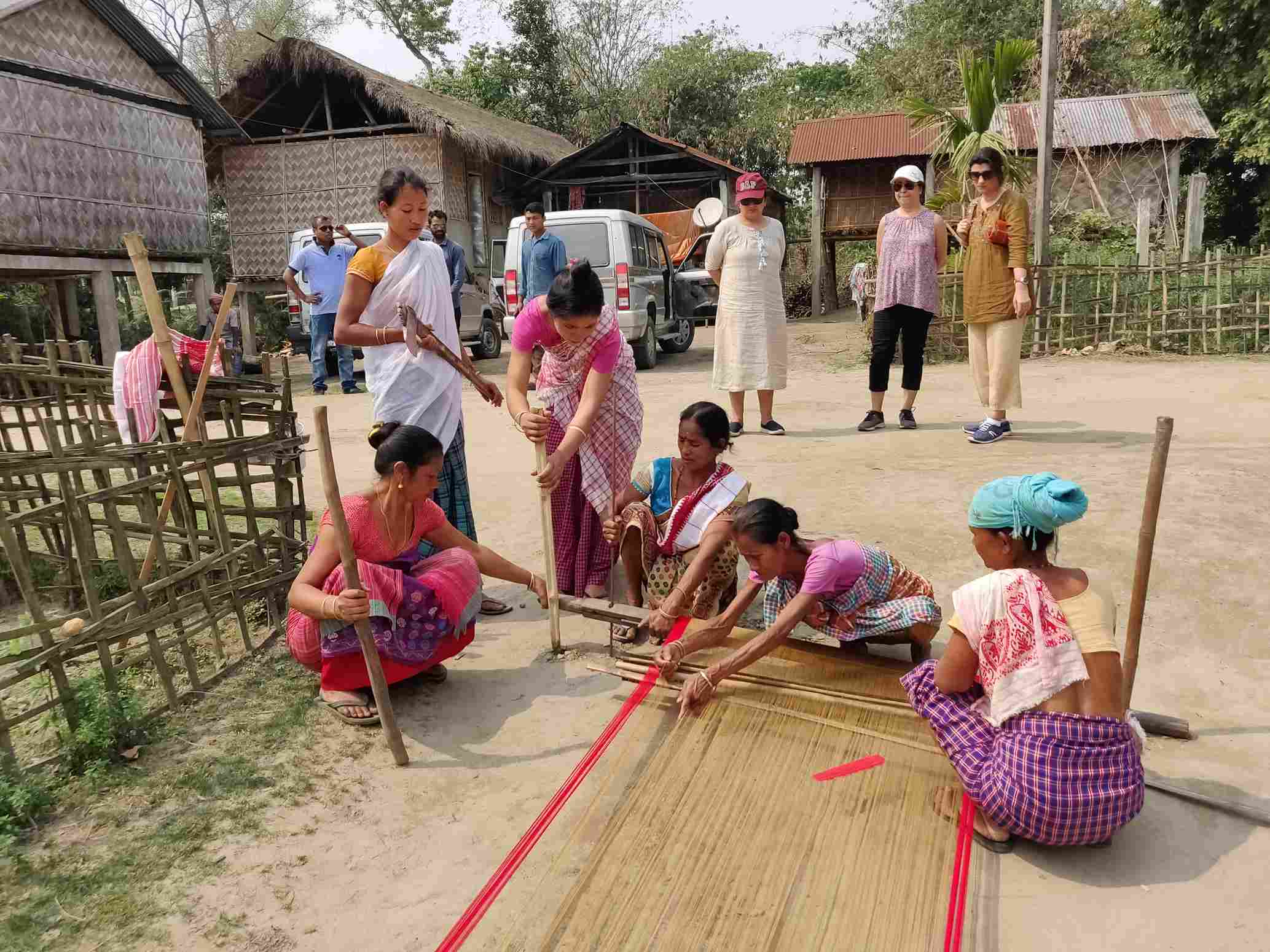 A warping demonstration in Assam for guests demonstrated by the local weavers